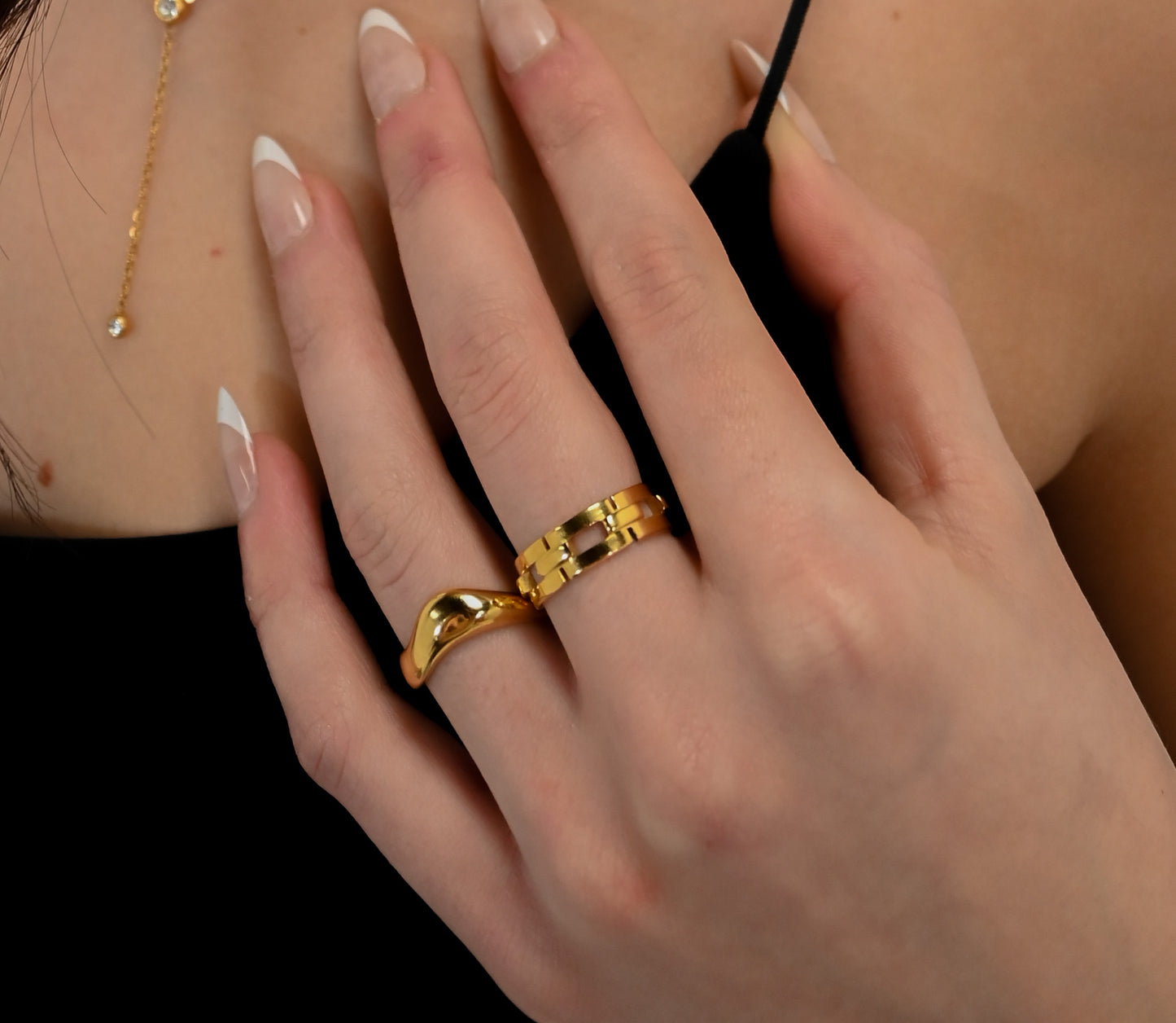Model wearing square unique gold plated ring