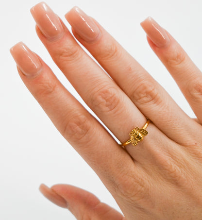 Bee ring in gold on hand