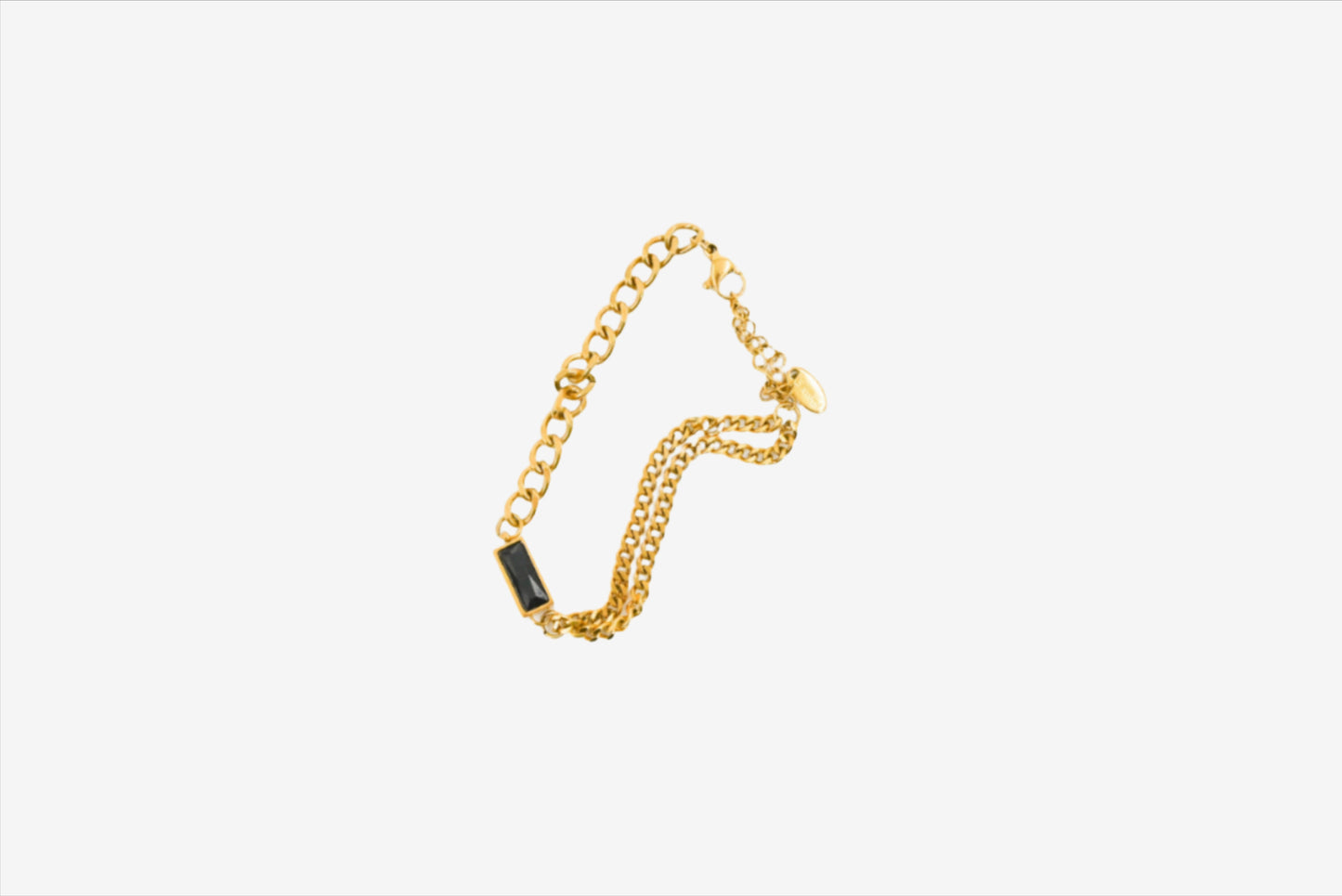 gold chain bracelet with black stone accent