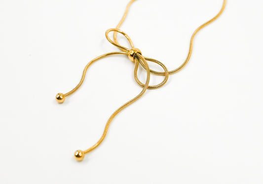 bow style chain in gold