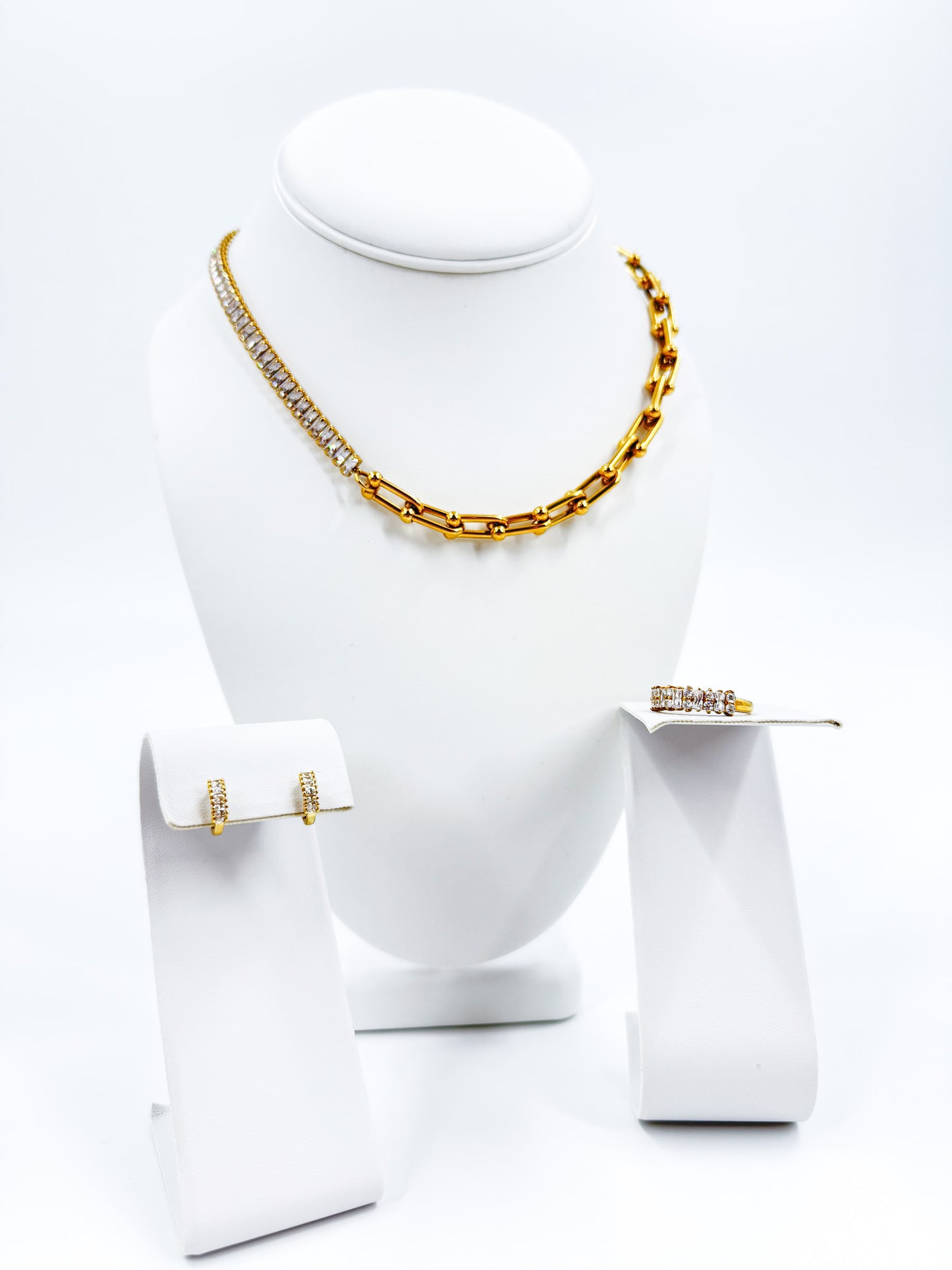 chain, earring, and ring collection in gold